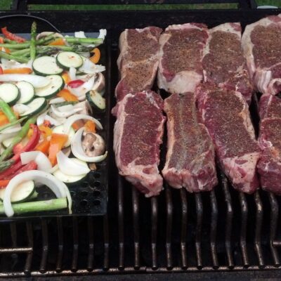 steak and veggies on the grill